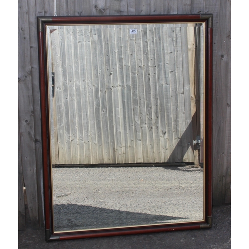 475 - Large bevelled wooden framed mirror approx. 130cm x 100cm