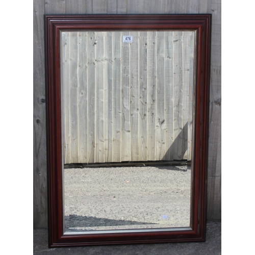 476 - Large bevelled wooden framed mirror approx. 100cm x 70cm