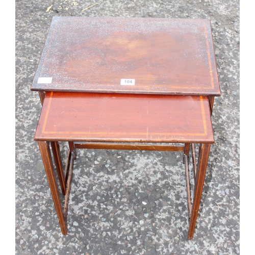 104 - An early 20th century mahogany nest of 2 tables