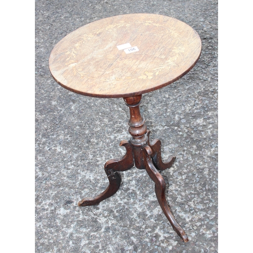 106 - An antique wine table with marquetry inlay