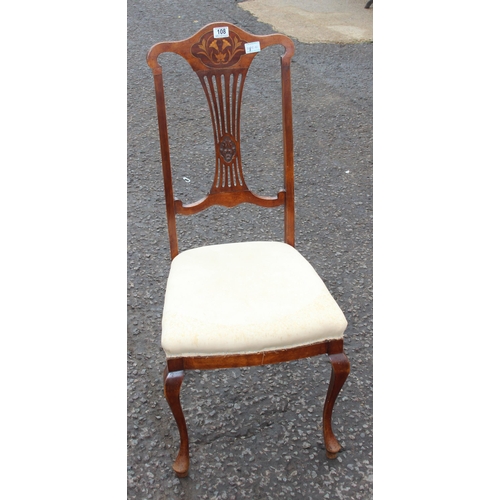 108 - An Edwardian bedroom chair with decorative marquetry inlay