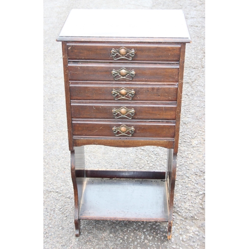 111 - An early 20th century 5 drawer music cabinet with brass handles