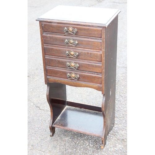 111 - An early 20th century 5 drawer music cabinet with brass handles