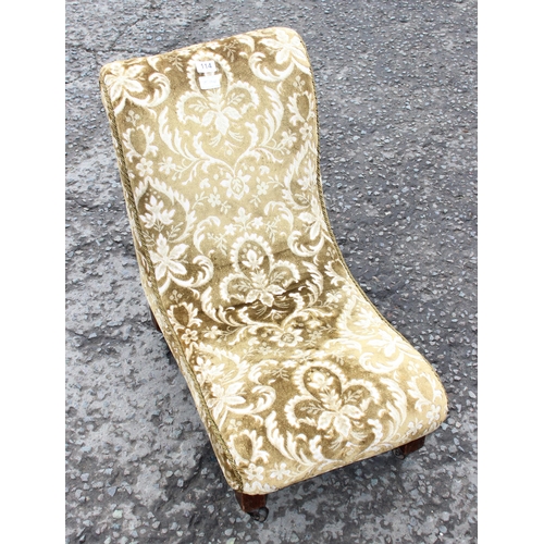 114 - A vintage upholstered 