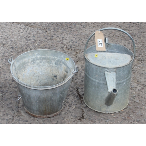 382 - Vintage galvanised watering can and a bucket