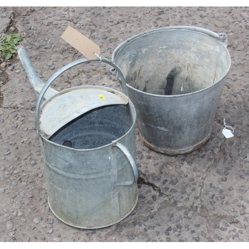 382 - Vintage galvanised watering can and a bucket