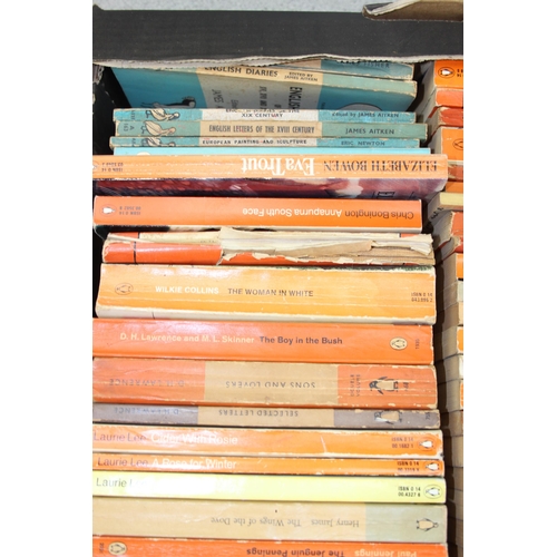 568 - A box of assorted vintage paperback books, mainly orange Penguin books