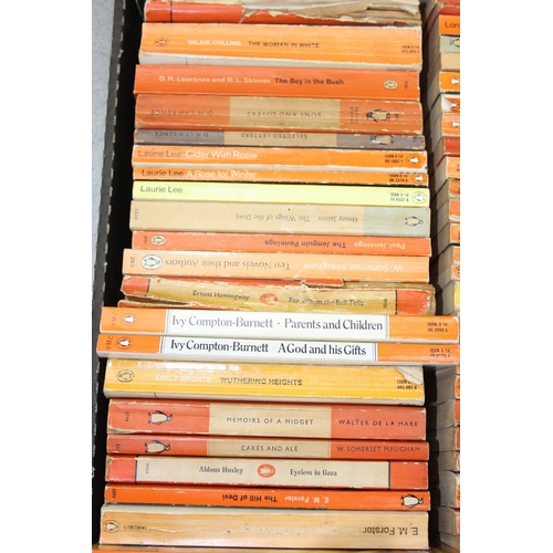 568 - A box of assorted vintage paperback books, mainly orange Penguin books