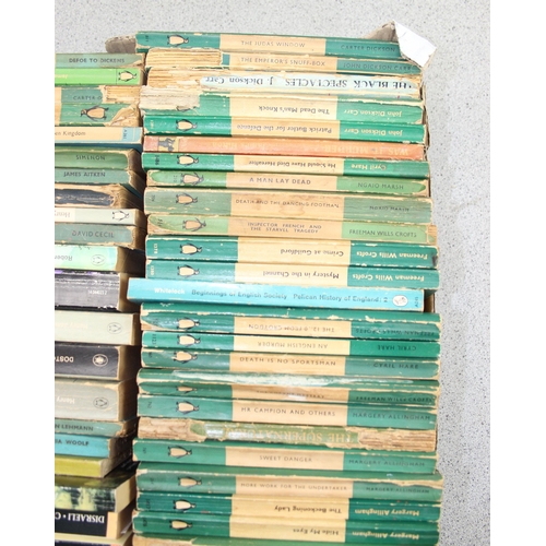 569 - A box of assorted vintage paperback books, mainly blue Penguin books