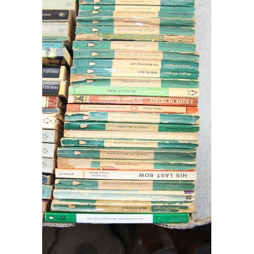 569 - A box of assorted vintage paperback books, mainly blue Penguin books