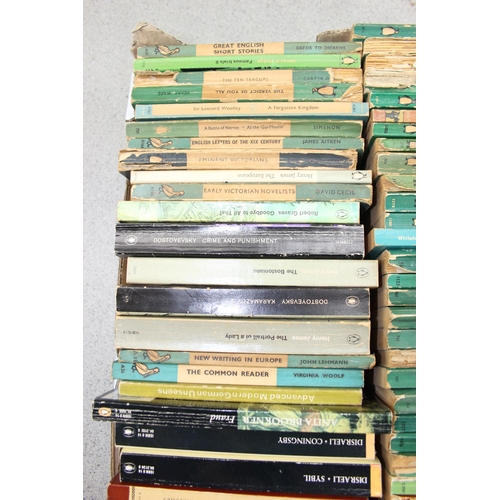 569 - A box of assorted vintage paperback books, mainly blue Penguin books