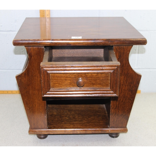 76 - Small oak coffee table with draw and magazine holders