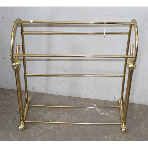 79 - 2 towel rails, one brass