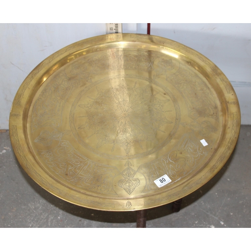 80 - Benares brass tray topped table with folding wooden base