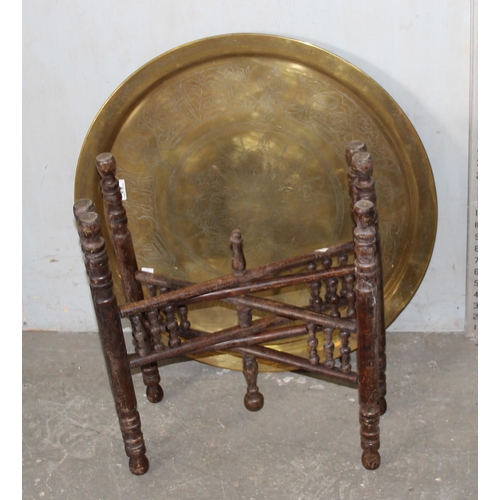 80 - Benares brass tray topped table with folding wooden base