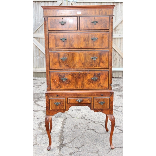 91 - A Queen Anne style walnut chest on stand with dressing slide, likely early 20th century, oak drawer ... 