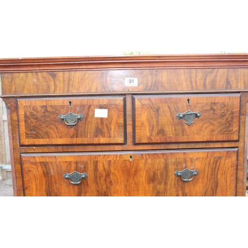 91 - A Queen Anne style walnut chest on stand with dressing slide, likely early 20th century, oak drawer ... 