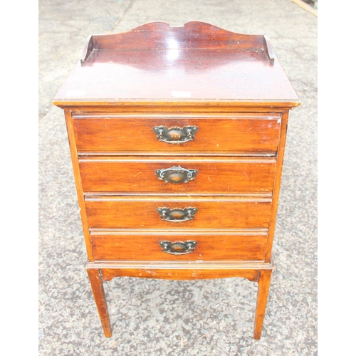 93 - An early 20th century 4 drawer music cabinet with Stone's Patent drawers