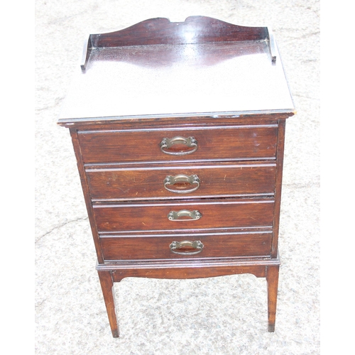 94 - An early 20th century 4 drawer music cabinet