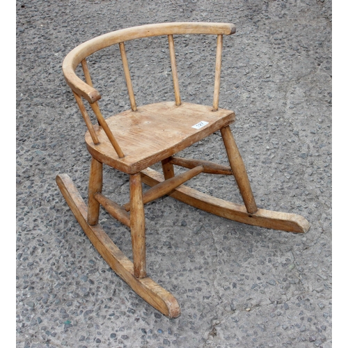 127 - An Ercol style child's rocking chair