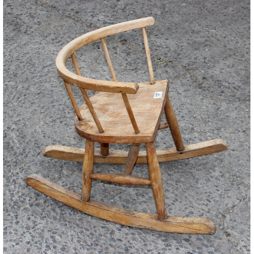 127 - An Ercol style child's rocking chair