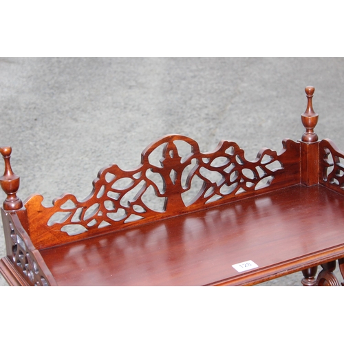 128 - A Victorian style mahogany 3 tier whatnot with fretwork ends and drawer