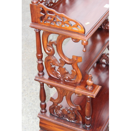 128 - A Victorian style mahogany 3 tier whatnot with fretwork ends and drawer