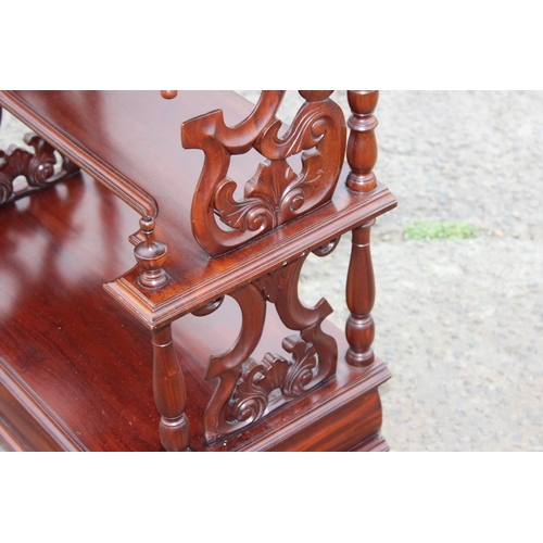 128 - A Victorian style mahogany 3 tier whatnot with fretwork ends and drawer