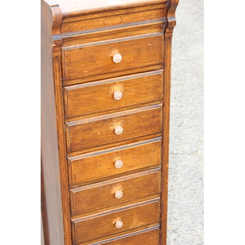 129 - An early 20th century 8 drawer floor standing collectors cabinet