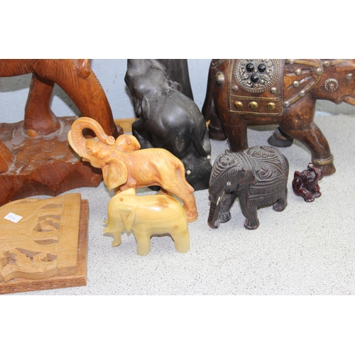 1784 - A qty of assorted elephant figures, to inc large carved wooden examples, bookends etc etc