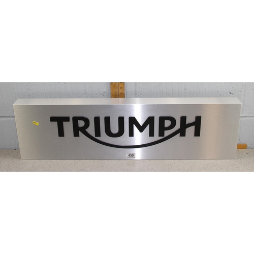 450 - A brushed Aluminium and Perspex Triumph workshop display sign