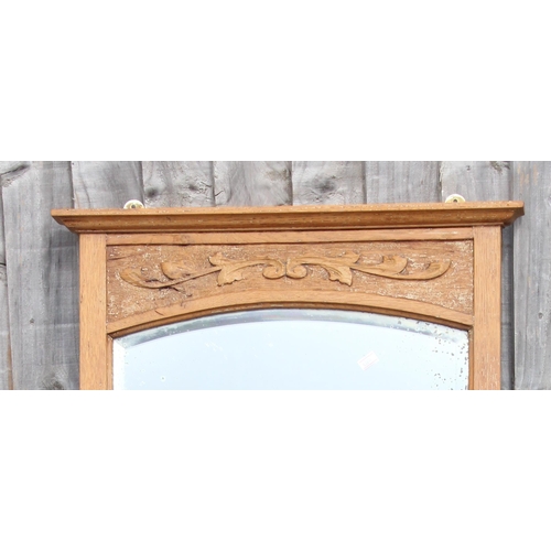 491 - Vintage oak framed mirror with carved details