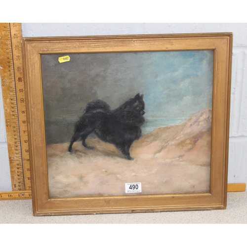 490 - An antique oil painting on canvas of a dog of a small black dog, initialled HW lower left, framed an... 