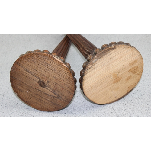 1862 - A pair of vintage turned oak candlesticks with fluted design