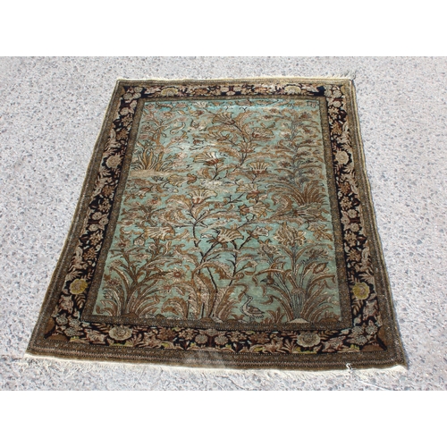 210a - A Persian silk Ghom rug, approximately 150cm x 100cm, extremely finely woven decorated with a 