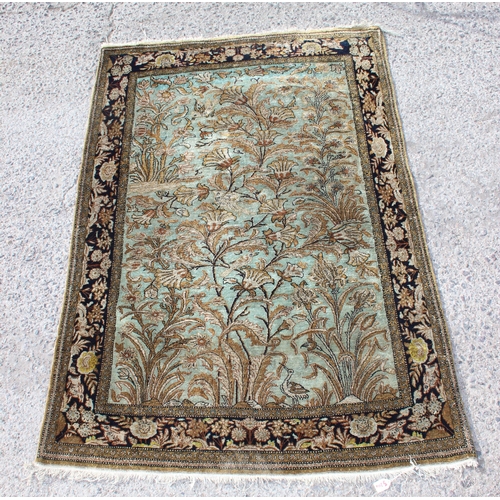 210a - A Persian silk Ghom rug, approximately 150cm x 100cm, extremely finely woven decorated with a 