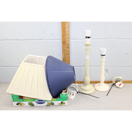 268 - 2 white painted wooden lamps and qty lampshades