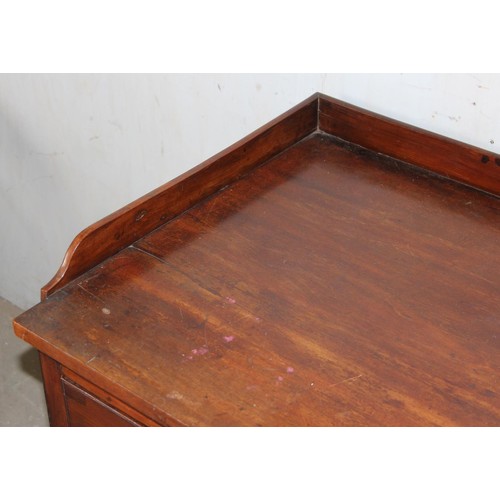 147 - A 19th century yew-wood and mahogany sideboard, with galleried top, two frieze drawers, 3’11” wide