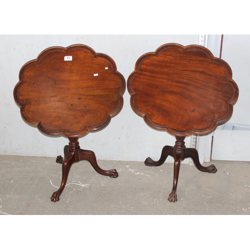 23 - Pair of 19th century mahogany pie-crust tilt-top tables with claw feet