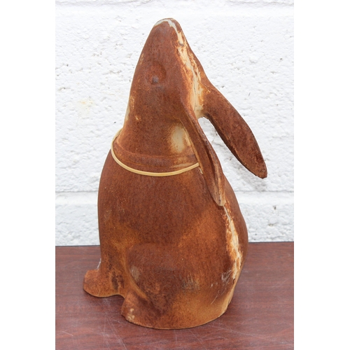 251 - A vintage style cast iron garden rabbit, approx 32cm tall