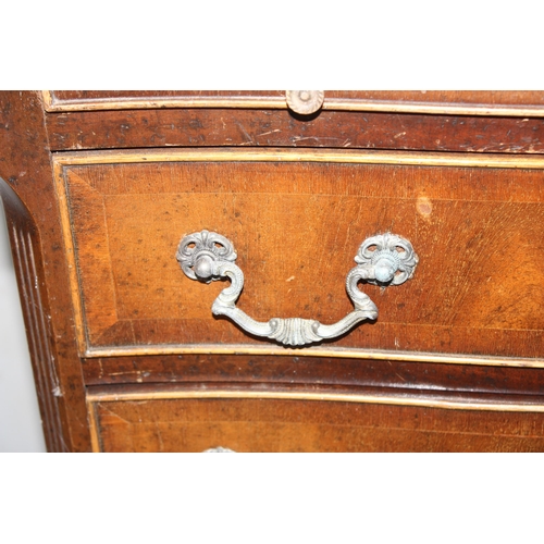 27 - Mahogany Georgian style serpentine-front 4-drawer chest of drawers with pull-out shelf