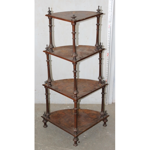 32 - An antique walnut veneered 4-tiered whatnot