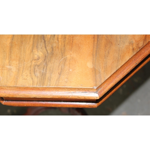 33 - An antique walnut trumpet shaped sewing table