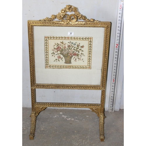 37 - Victorian carved gilt-wood firescreen with glazed tapestry panel