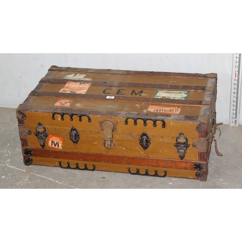 47 - A vintage shipping trunk with labels by W.W. Winship