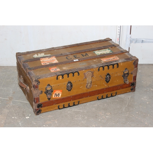 47 - A vintage shipping trunk with labels by W.W. Winship