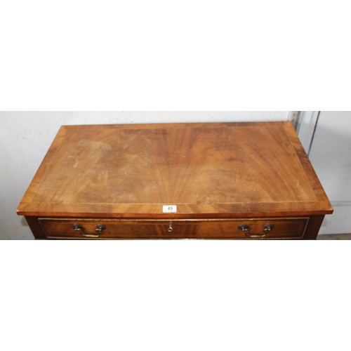 49 - A 20th century mahogany console table with single drawer