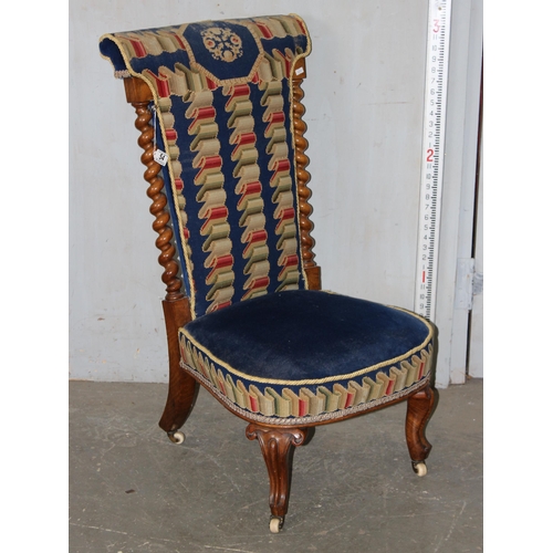 54 - An antique Prie Dieu kneeling chair with tapestry seat and barleytwist supports