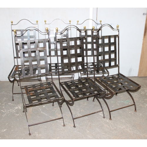 56 - A set of 6 wrought iron chairs with suede cushions and brass pommels