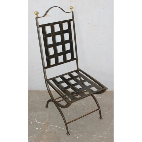 56 - A set of 6 wrought iron chairs with suede cushions and brass pommels